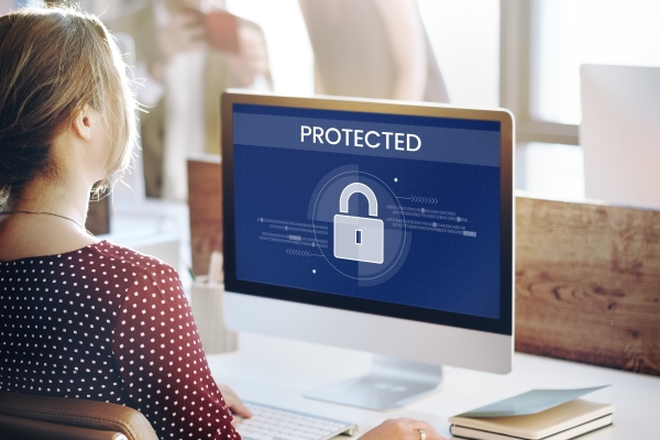 woman-using-computer-protected-desktop